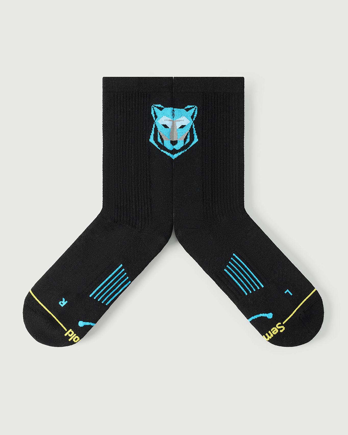Close-up of black Regal Tiger socks showing the inner arch spine for enhanced stability.