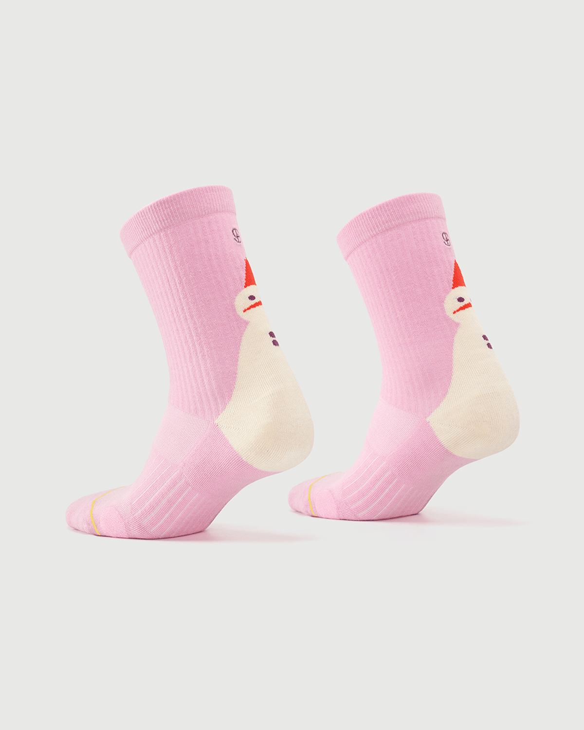 Pink Sakura Snowman socks on a foot form, displaying the character design and side fit.