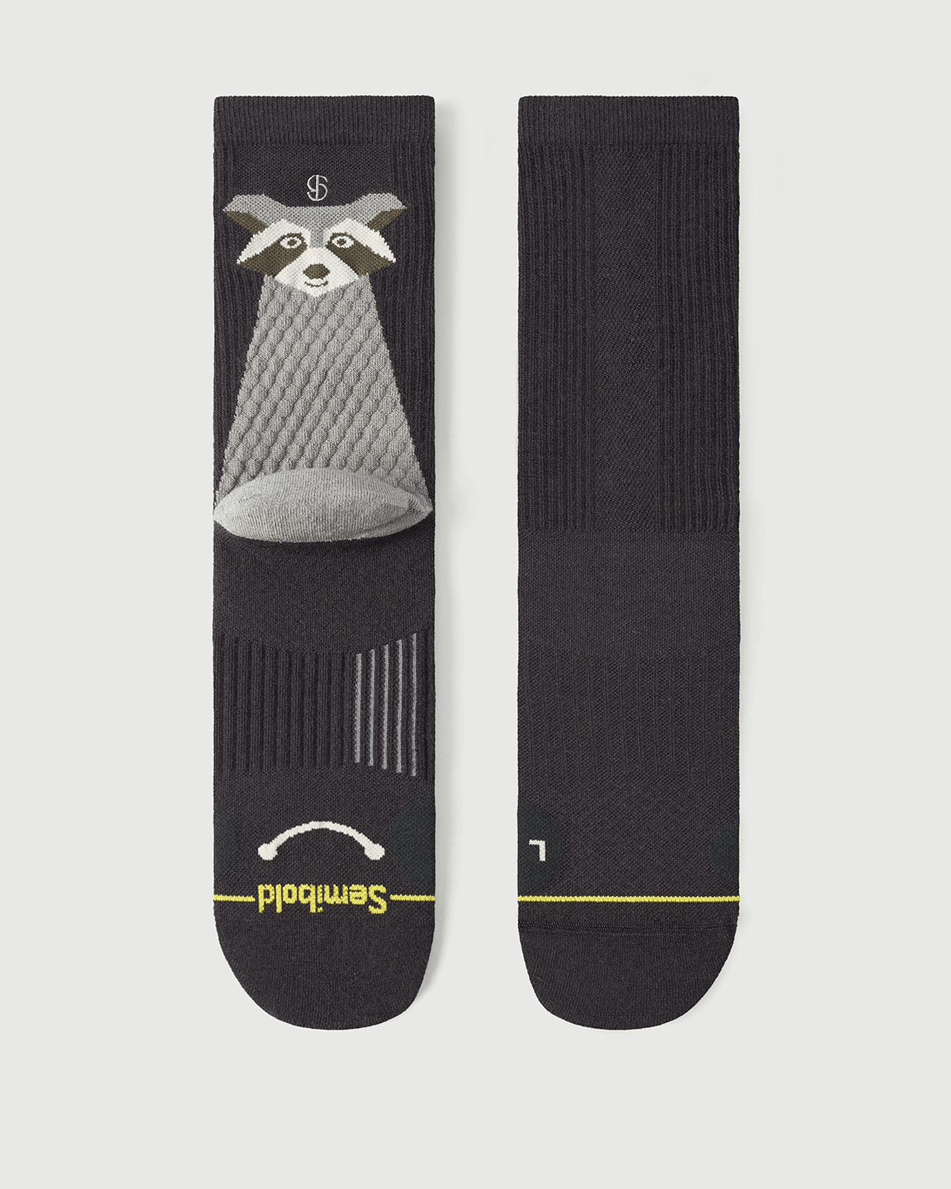 Flat lay of Semibold Scrubby Raccoon grey and black Merino socks, front and back view.