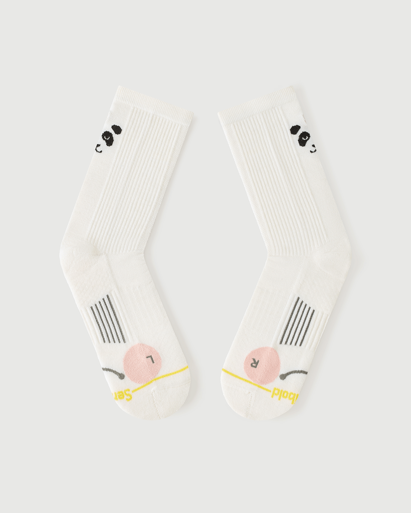 Internal flat lay of white Naughty Panda socks showcasing the arch spine and supportive fit.