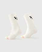 White Naughty Panda socks on a foot form, showing the playful panda character on the heel.