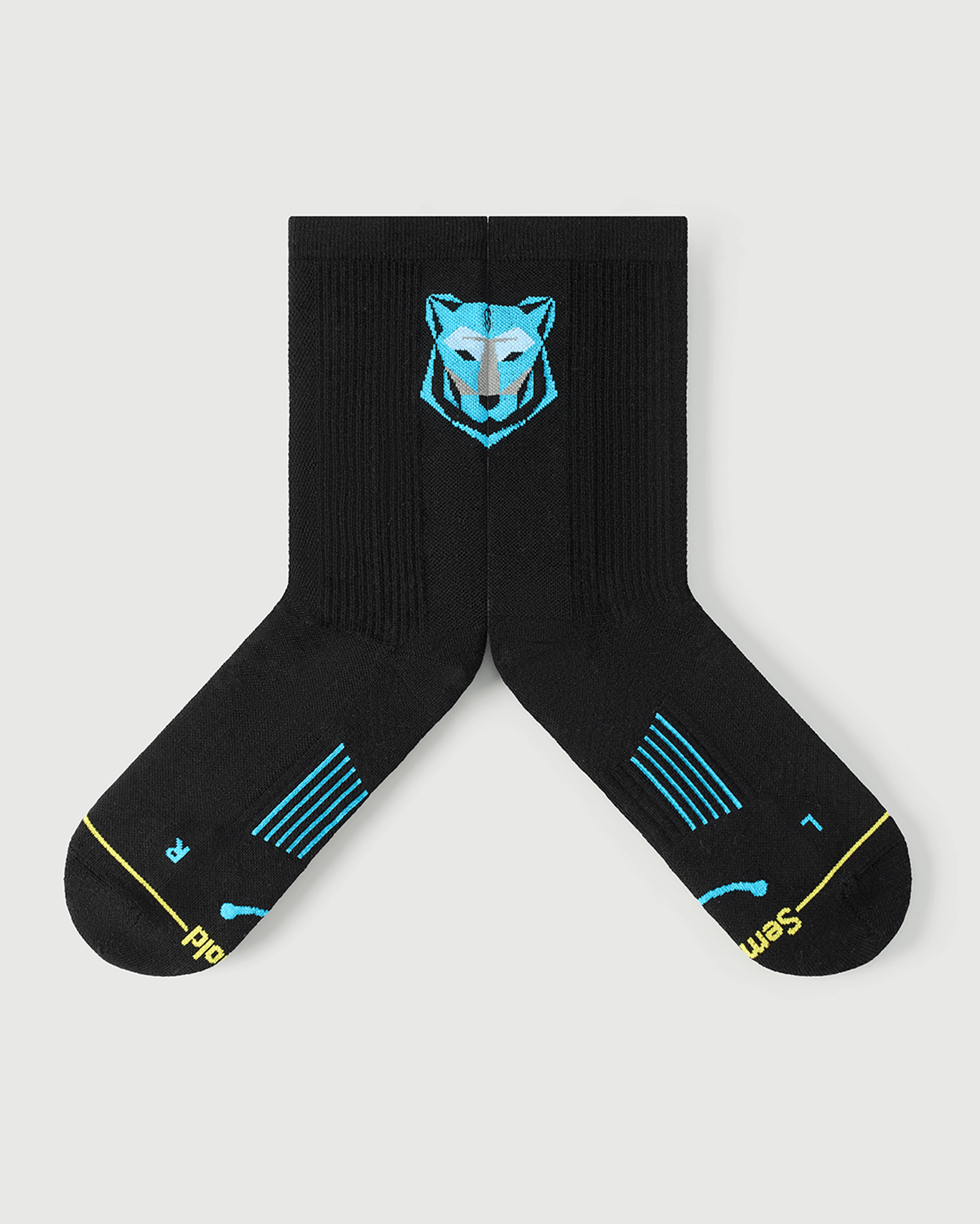 Close-up of black Regal Tiger socks showing the inner arch spine for enhanced stability.