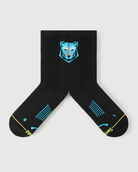 Close-up of black Regal Tiger socks showing the inner arch spine for enhanced stability.