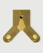 Detailed flat lay of Royal Puffin yellow socks highlighting the inner arch spine for extra stability.