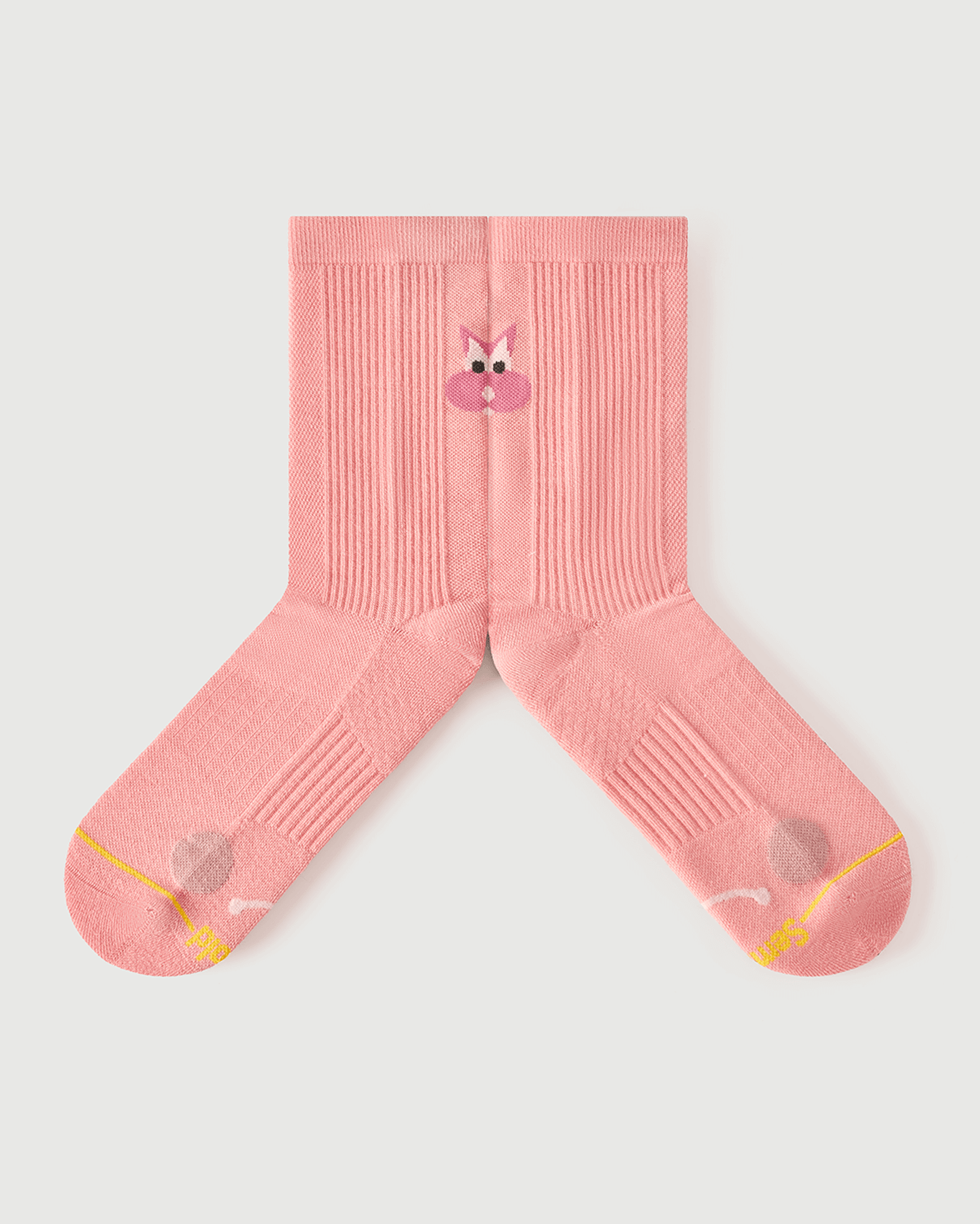 Internal flat lay of peach Savoring Squirrel socks highlighting the arch spine for superior comfort.