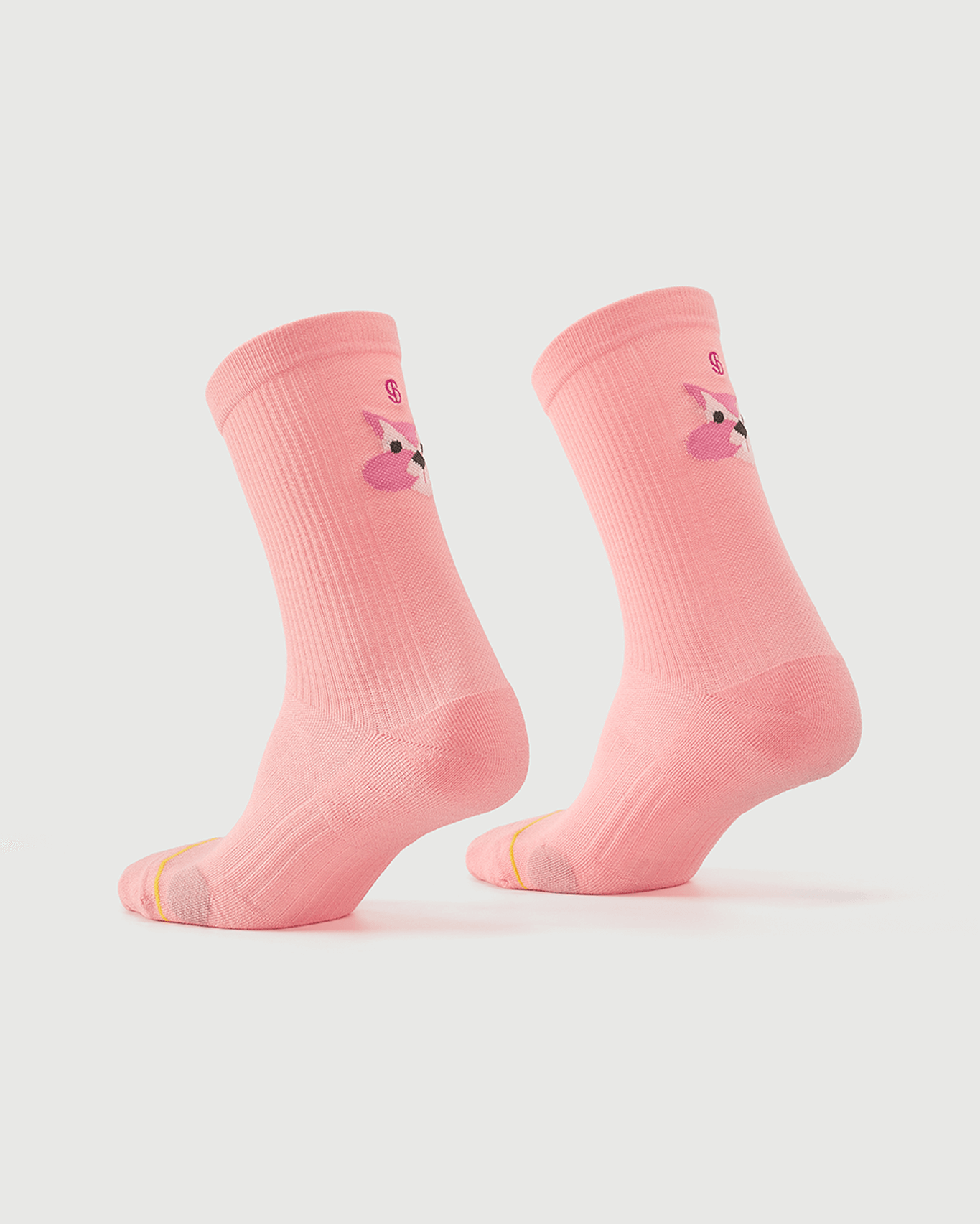 Peach Savoring Squirrel socks on a foot form, displaying the squirrel pattern and side profile.
