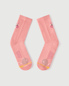 Flat lay of the lateral side of peach Savoring Squirrel socks, focusing on the toe cushioning.