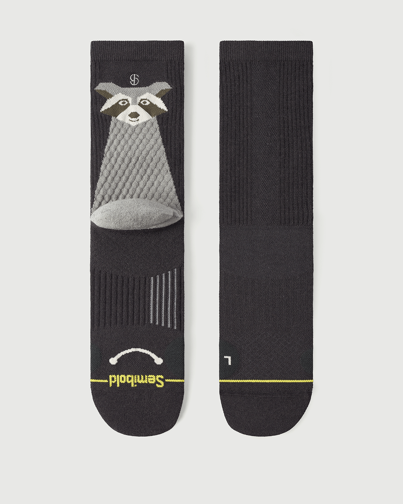 Flat lay of Semibold Scrubby Raccoon grey and black Merino socks, front and back view.