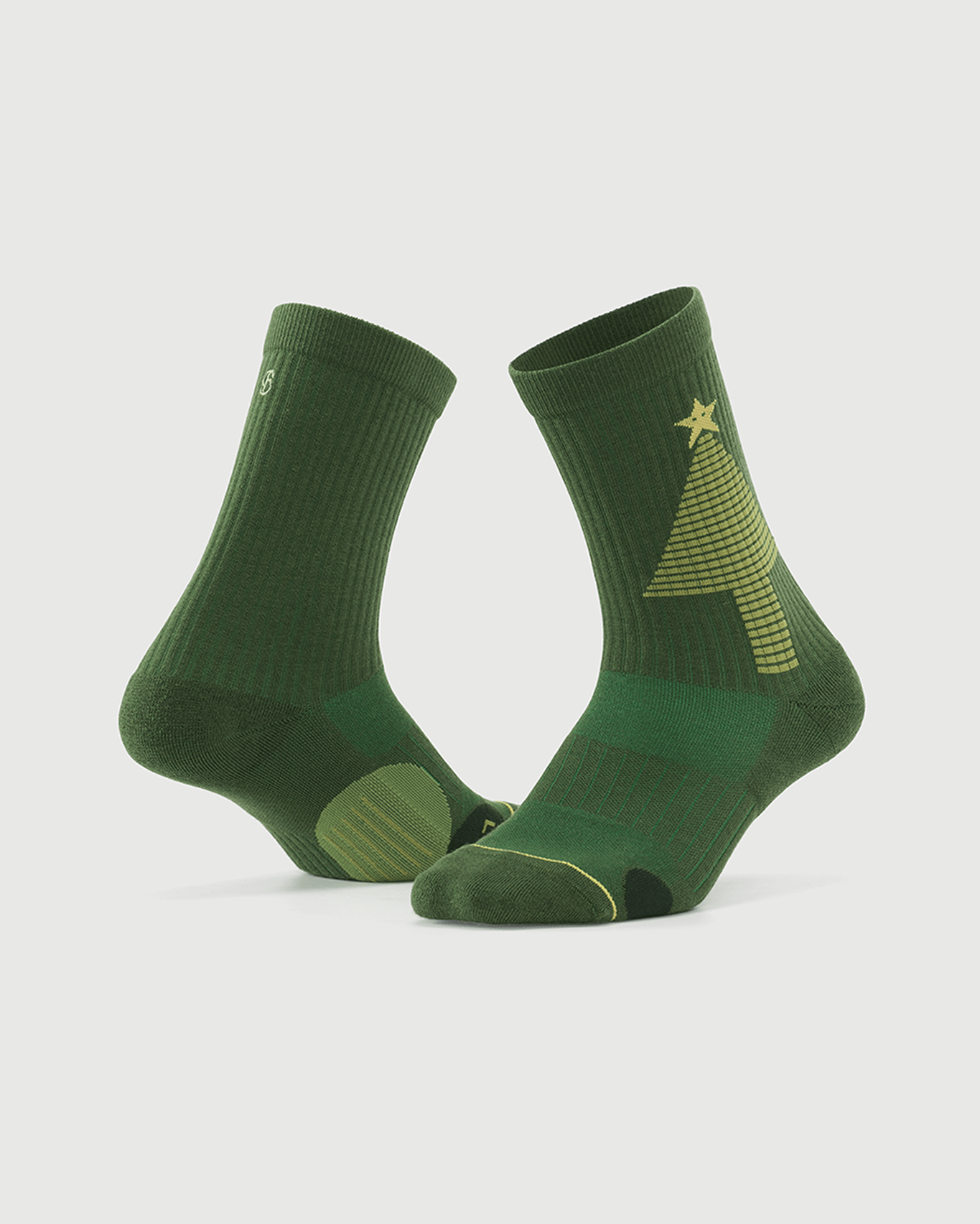 Starry Pine Merino wool crew socks on foot forms, providing a 360-degree view of the inner and outer construction and patterns.