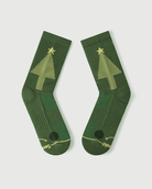 Detailed view of Starry Pine Merino wool socks showing the targeted toe cushioning and the iconic yellow Christmas tree graphic.